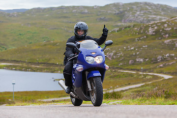 Image showing Motorcyclist in the Scottish Highlands