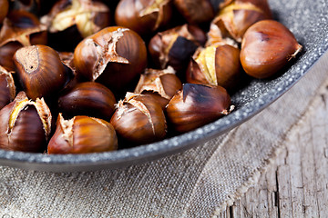 Image showing roasted chestnuts in a pan 