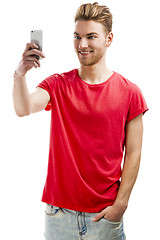 Image showing Young man taking a selfie