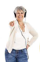 Image showing Elderly woman listen music