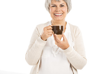 Image showing Elderly woman drinking coffee