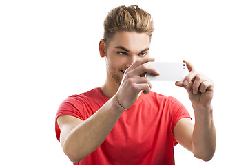 Image showing Young man taking a selfie