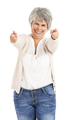 Image showing Happy Elderly woman pointing