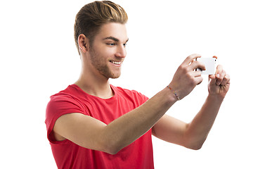 Image showing Young man taking a selfie