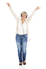 Image showing Elderly woman listen music
