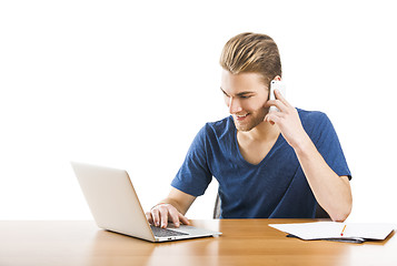 Image showing Young man and talking at phone