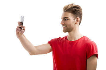 Image showing Young man taking a selfie