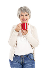 Image showing Elderly woman drinking coffee