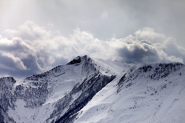 Image showing Mountains in evening cloudy sky