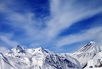 Image showing Winter snowy mountains in windy day
