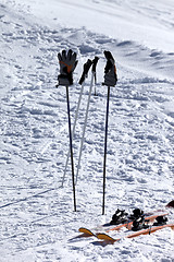 Image showing Skiing equipment on ski slope at sun day