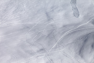 Image showing Off piste slope with traces of skis, snowboarding and avalanche