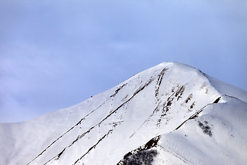 Image showing Off-piste snowy slope in morning