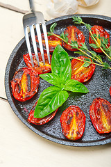 Image showing baked cherry tomatoes with basil and thyme