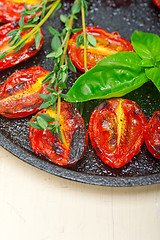 Image showing baked cherry tomatoes with basil and thyme