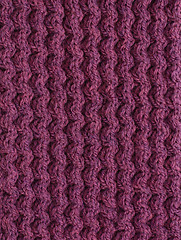 Image showing Purple cable knitting stitch 