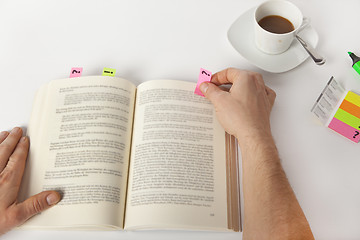 Image showing make notes in a book