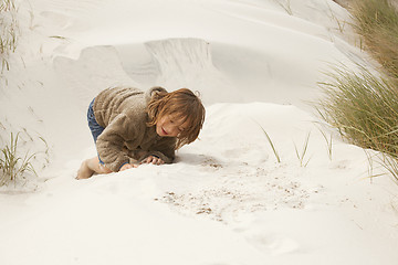 Image showing boy playing in the dunes