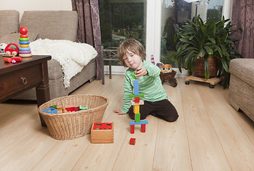Image showing boy playing with building blocks
