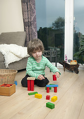 Image showing boy playing on the flooring