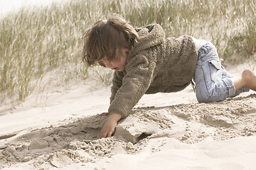 Image showing boy playing in the sand