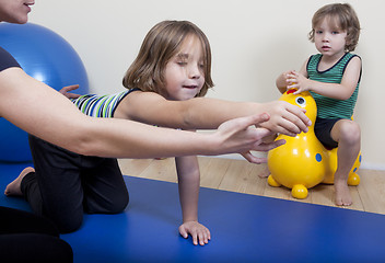 Image showing Physiotherapy with two children