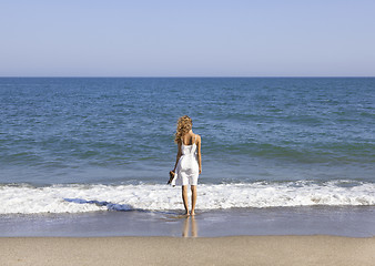 Image showing Vacationer overlooking the sea