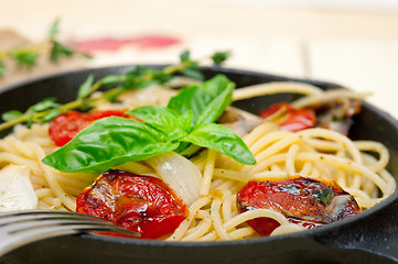 Image showing spaghetti pasta with baked cherry tomatoes and basil 