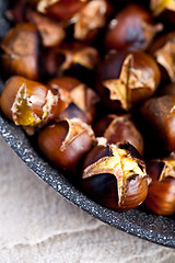 Image showing roasted chestnuts in a pan