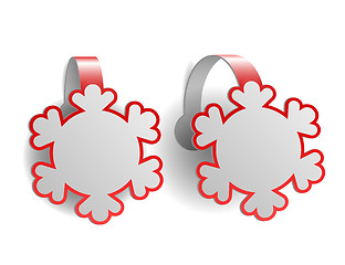 Image showing Red advertising wobblers shaped like snowflakes