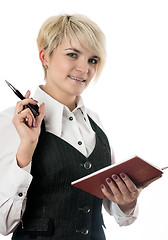 Image showing Pretty business lady with organizer