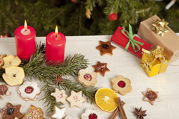 Image showing table with gifts and christmas candles