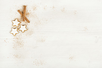 Image showing White background with cinnamon stars