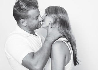 Image showing Couple kiss black white