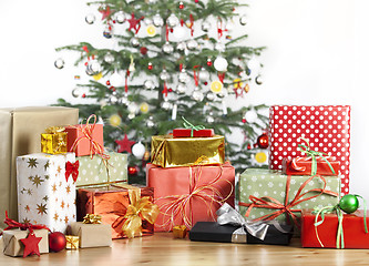 Image showing christmas tree with lots of gifts