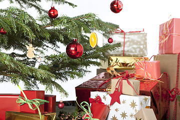 Image showing Christmas tree with red balls and gifts