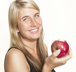 Image showing laughing woman with apple