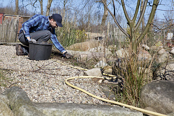 Image showing spring cleaning in the garden