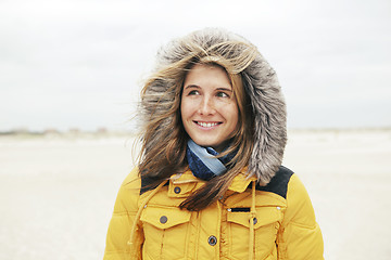 Image showing Woman in winter on the beach