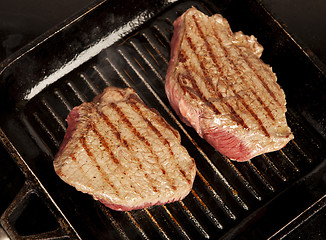 Image showing two steaks in the pan