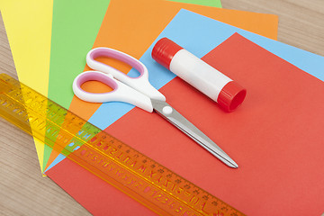 Image showing Paper with ruler glue and scissors