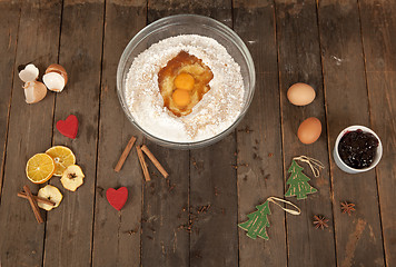 Image showing Baking ingredients on old wooden table