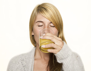 Image showing woman  drinking juice