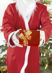 Image showing Santa Claus with red gift