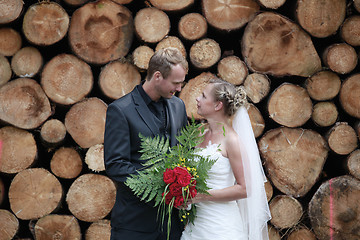 Image showing wedding couple with wedding bouquet