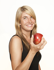 Image showing young woman with apple