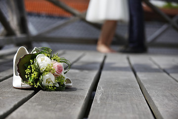 Image showing Bridal bouquet lying on the floor