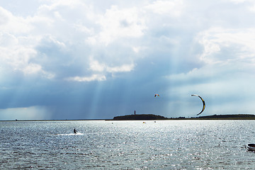 Image showing sunbeam with kitesurfer