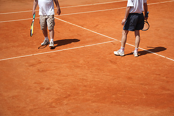 Image showing Male couple playing tennis