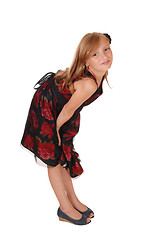 Image showing Girl bending down.